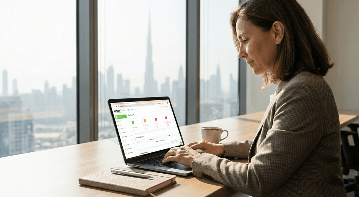 a female working a laptop on brown desk